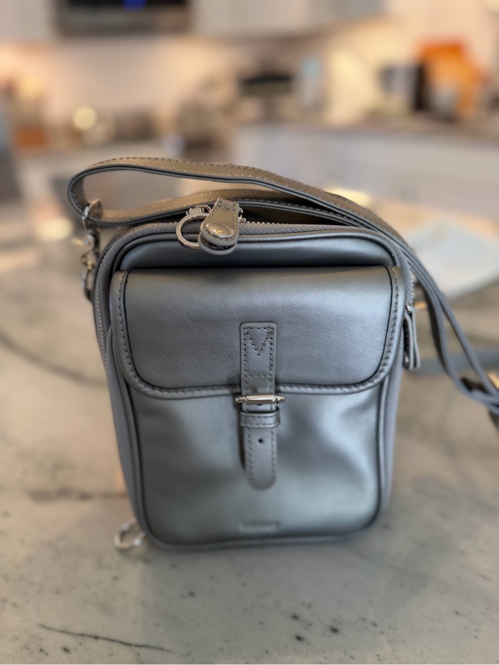 Compact Gray Leather Crossbody Bag with Front Flap